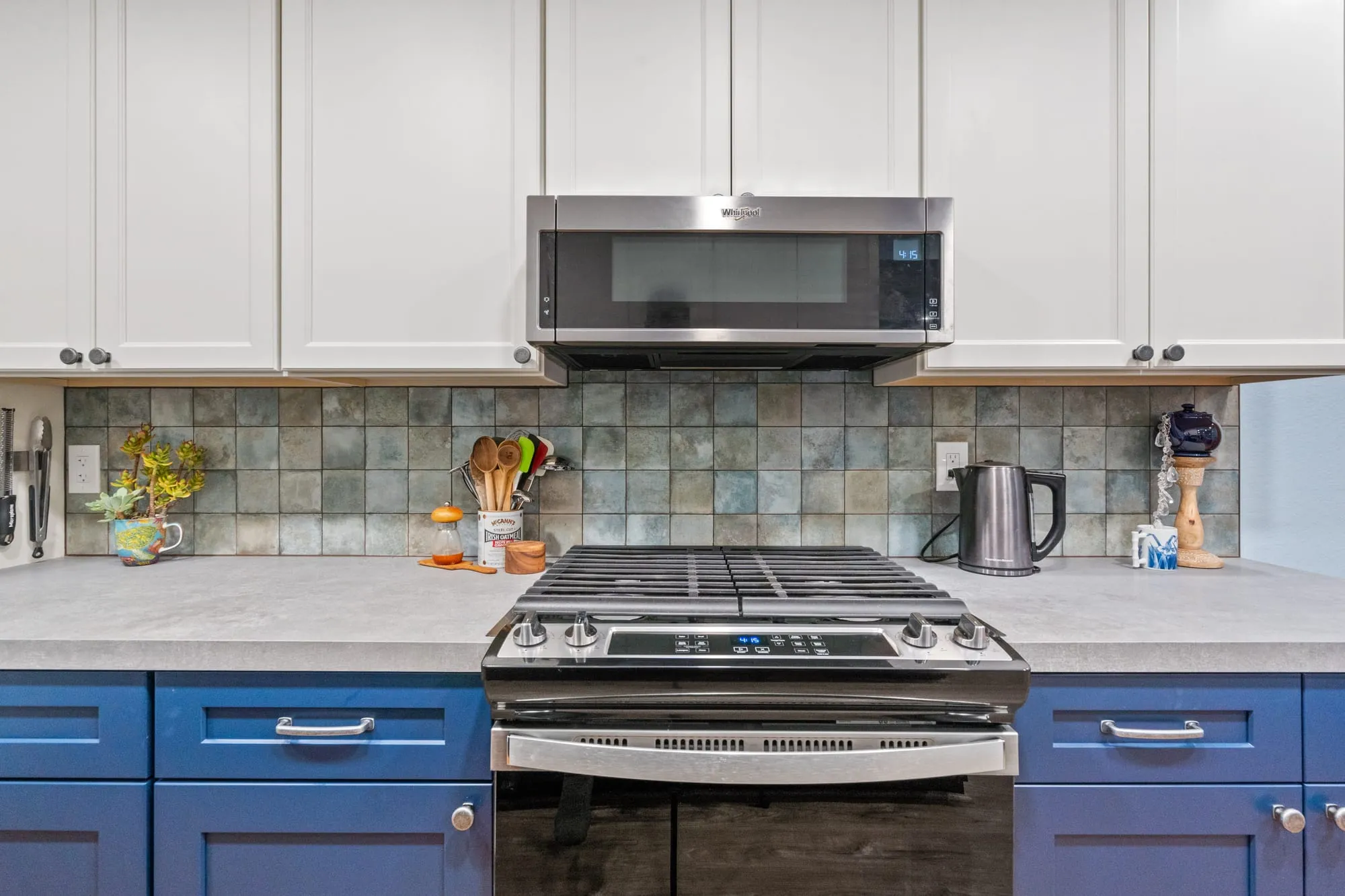 Cooktop against the slate-tone backsplash