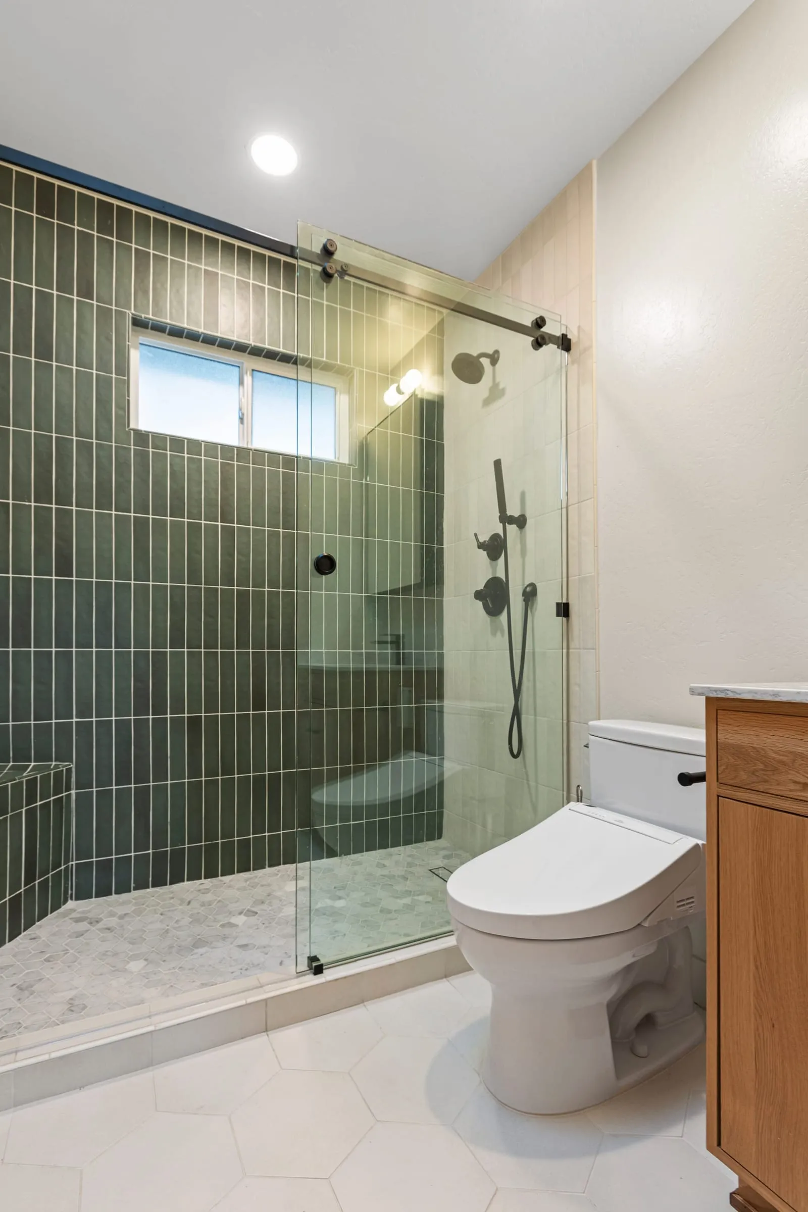 green stacked tile shower
