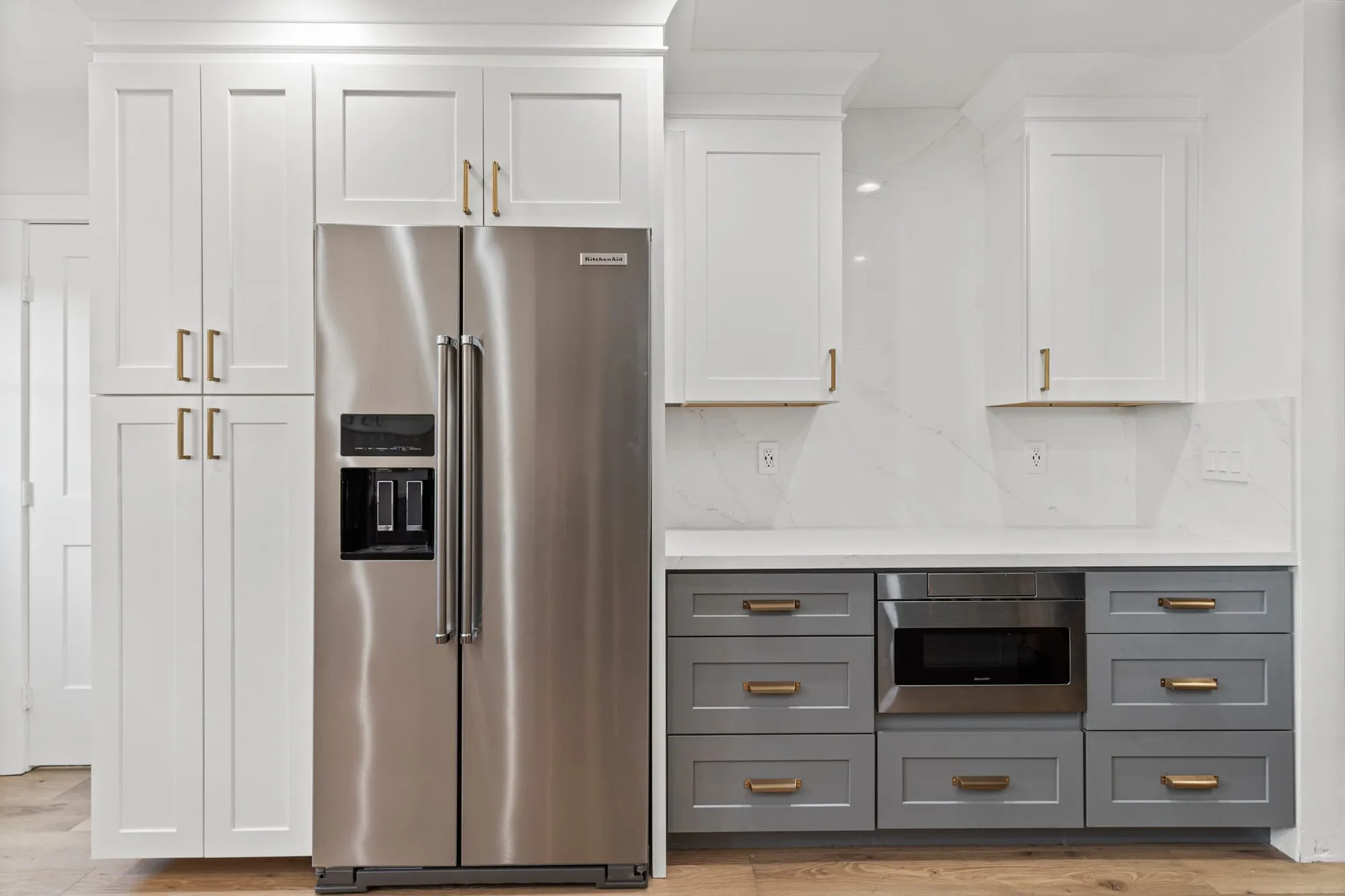 Tall cabinet run with the refrigerator